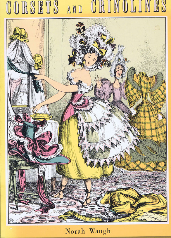 A bright yellow book cover with the illustration of a woman in a huge ruffled hat and petticoat with articles of clothing all around her. 