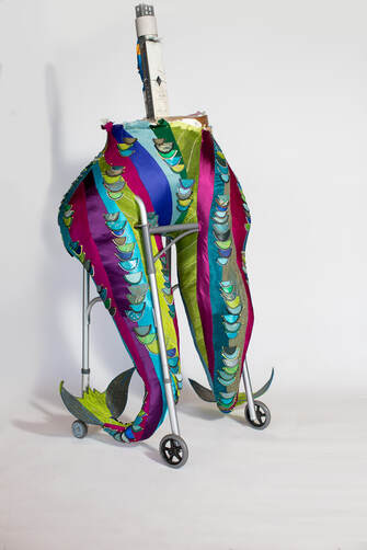 A colorful pair of legs/tail fins built into a walker.