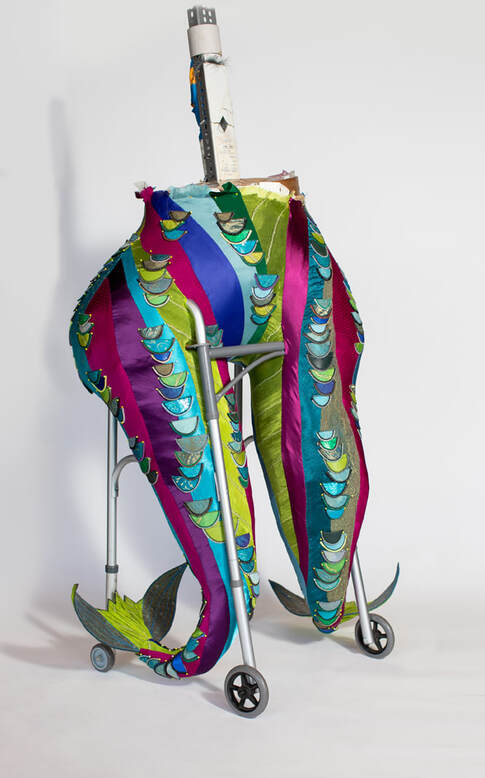 A pair of colorful legs/fishtails built into a walker.