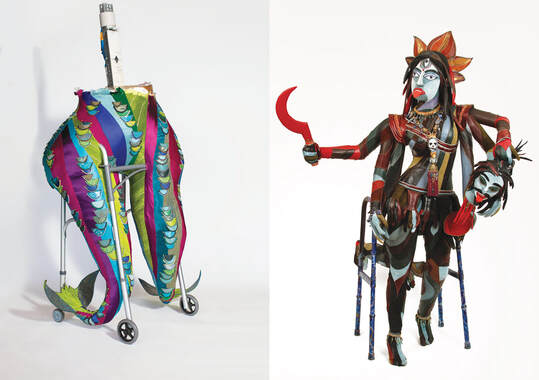 On the left is a pair of legs/tail fins built into a walker. The legs are covered in colorful swirls of fabric with contrasting scales. On the right is a multi-colored, multi limbed goddess with three eyes built into a walker. She holds a red scythe in one upper arm and a severed demon head in the other upper arm.